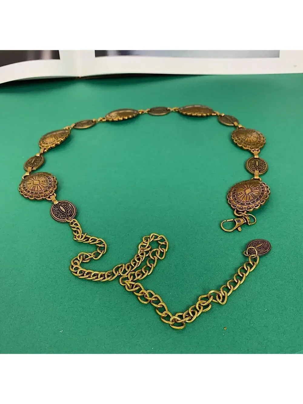 Bronze Y2K style indie western belt with bronze buckle and metal sun and moon